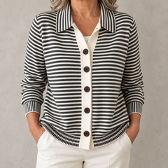 Nola striped button cardigan in Black on a warm gray background