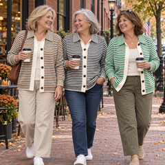 Three women wearing Nola cardigans in Boston